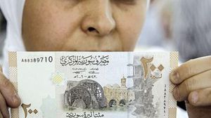 سورية تحمل 200 ليرة سورية - (أرشيفية)