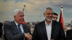 من مشاهد اتفاق المصالحة بين حركتي حماس وفتح - ا ف ب