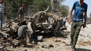 ركام سيارة مفخخة انفجرت في الذكرى الحادية عشرة لسقوط بغداد - ا ف ب