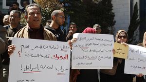 وقفة تضامنية مع الفلسطينيين في مخيم اليرموك السوري - الأناضول