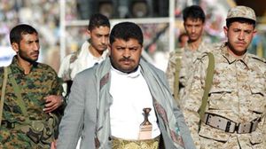 رئيس المجلس الثوري محمد علي الحوثي يتوسط رجاله  - أ ف ب