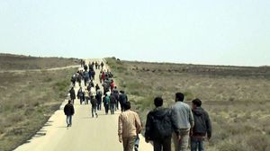 صورة للعمال بعد إطلاق سراحهم من قبل تنظيم الدولة - وكالة أعماق