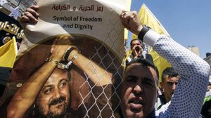 الأسير البرغوثي يحظى بشعبية داخل حركة فتح لمواقفه من المقاومة المسلحة- أ ف ب 