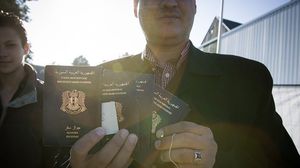 رفع فلكي لرسوم إصدار جواز السفر السوري- جيتي