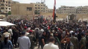 مؤيدو النظام السوري وقواته يحتفلون بـ"ذكرى الجلاء"- وكالة سانا