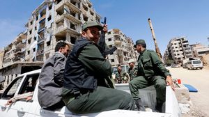 النظام السوري بات يسيطر على مدينة دوما بعد خروج المعارضين باتفاق تهجير- جيتي