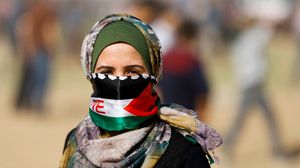 قناصة الاحتلال باغتوا المرأة الفلسطينية برصاصة أسقطتها أرضا- جيتي