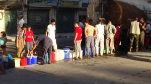 طوابير طويلة للحصول على مياه الشرب في حلب (أرشيفية)
