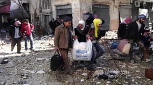 خرج من تبقى من سكان حمص القديمة بعد الاتفاق بين الثوار والنظام