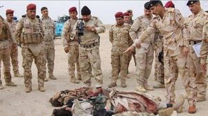 القوات العراقية توثق قتلى "داعش" في عملية أمنية - ا ف ب