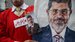 محتجون في نيويورك ضد حكم القضاء المصري بإحالة أوراق مرسي للمفتي - الأناضول