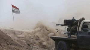 القوات العراقية تستعد لاقتحام مركز مدينة القائم غرب الأنبار- أ ف ب 