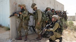 بن يشاي: توترات تتزامن مع تدريبات للجيش الإسرائيلي تنخرط فيها جميع أسلحة الجيش في مواجهة حربية كبرى- ا ف ب