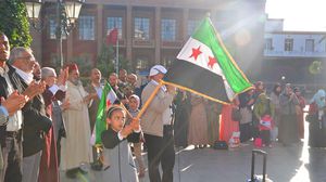 طالب المحتجون بوقف المجازر في سوريا وخاصة بحلب، ورحيل نظام الأسد "الجزار"- عربي21