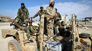 القوات التابعة لحفتر ألقت القبض على جزائري في مدينة بنغازي يتبع تنظيم الدولة- ا ف ب