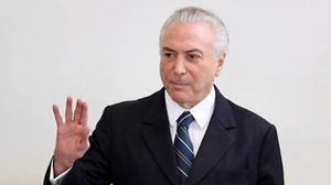 يتعرض رئيس البرازيل لاتهامات بفضيحة فساد قد تطيح به- أ ف ب