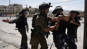 كانت قوات الاحتلال أصابت شابين فلسطينيين صباح الجمعة على مدخل قرية النبي صالح شمال غربي رام الله- أ ف ب