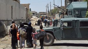تنظيم الدولة يزوع انتحاريين بين الهاربين من الموصل- أ ف ب
