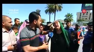 السيدة العراقية وصف شعارات الحشد الشعبي بـ"الكاذبة"- يوتيوب