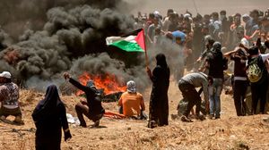 طالب وزير الخارجية التركي منظمة التعاون الإسلامي والجامعة العربية باتخاذ خطوات مشتركة إزاء مجزرة غزة- جيتي
