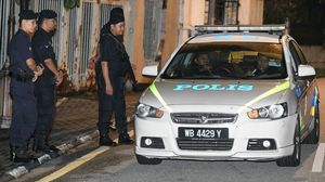 الشرطة الماليزية في محيط منزل نجيب- جيتي