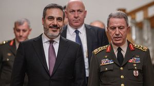 رئيسا هيئة أركان الجيش وجهاز الاستخبارات التركية خلوصي أكار وهاكان فيدان- جيتي