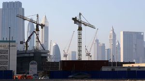 أسهم صعود جماعي لأسهم قطاع العقار في إقفال مؤشر سوق دبي فوق ال3000 نقطة،- جيتي 