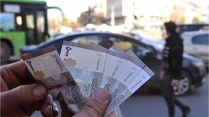 القرار وُصف بكونه بداية الانفراجة على الاقتصاد السوري المحطّم- جيتي