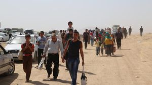 الآلاف ينزحون من الموصل إلى أربيل في العراق - الآلاف ينزحون من الموصل إلى أربيل في العراق (22)