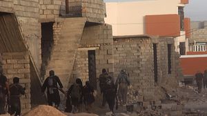 مقاتلون خلال معارك السيطرة على الموصل - فيس بوك