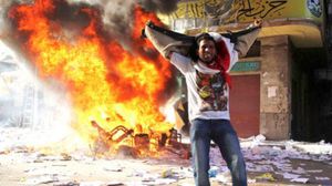 حرق إحدى مقرات حزب الحرية والعدالة بمصر (أرشيفية) - ا ف ب 
