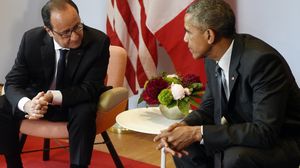 ساركوزي كان يرى أن أمريكا هي المتسببة بالأزمة الاقتصادية العالمية وهو القادر على حلها ـ أ ف ب 