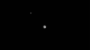 رصد التلسكوب الفضائي هابل أربعة أقمار صغيرة لهذا الكوكب القزم - أ ف ب 