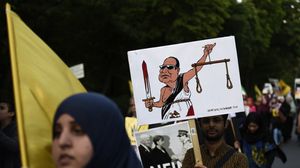 اعترف المجلس القومي لحقوق الإنسان ببعض الانتهاكات في المعتقلات المصرية - أ ف ب