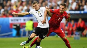 اقتربت ألمانيا وبولندا من التأهل إلى دور الستة عشر  - ا ف ب