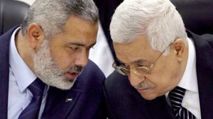 الرئيس الفلسطيني محمود عباس ورئيس الحكومة المقالة إسماعيل هنية ـ أرشيفية