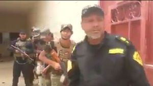 "المقدم هاشم" قبل تنفيذ عملية اعتقال قناص من تنظيم الدولة- من الفيديو