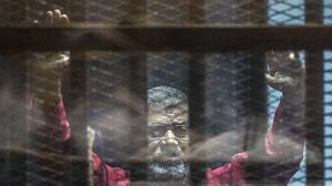 الرئيس مرسي كان تحدث عن تعرضه "لجرائم تؤثر على حياته"- أ ف ب 