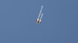 جيش النظام السوري قال إن التحالف أسقط طائرة تابعة له وفقد الطيار- أ ف ب