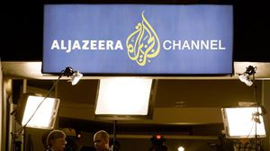 وزير الإعلام البحريني اتهم قناة الجزيرة بأنها تنتهك ضوابط العمل الإعلامي- أ ف ب 