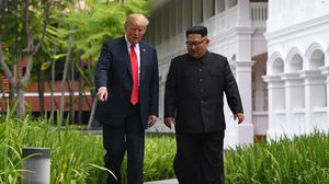 تعهد كيم في بيان خلال قمة مع ترامب بالعمل على نزع الأسلحة النووية- جيتي