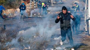 تندلع المواجهات مع قوات الاحتلال بالضفة عقب مسيرات رافضة لخطة الضم الإسرائيلية- جيتي