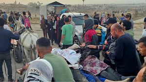 أطلق الاحتلال نيرانه تجاه مئات المتوجهين إلى مركز المساعدات- جيتي