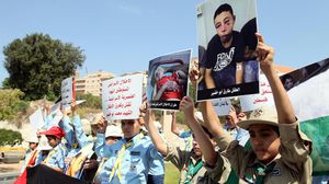 أطفال فلسطينيون في لبنان يعلنون تضامنهم مع أطفال غزة والضفة - الأناضول