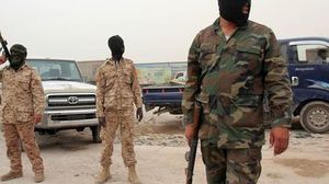 كتائب القذافي الأمنية يلتحقون بمسلحين متمردين في مطار طرابلس - أرشيفية
