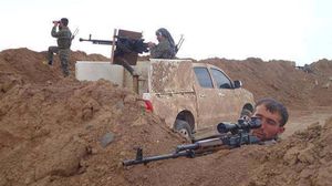 اشتباكات بين المقاتلين الأكراد وعناصر داعش - ا ف ب