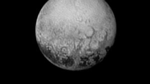 صورة التقطها المسبار "نيو هورايزنز" للكوكب بلوتو في ساعة مبكرة - أ ف ب