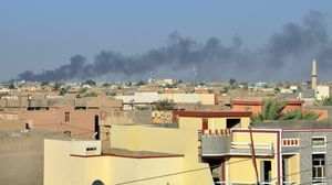 الطائرات العراقية تقصف بالبراميل المتفجرة مدينة الفلوجة - أ ف ب