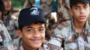 فتية مشاركون في معسكرات التدريب التي تقيمها القسام - عربي21