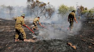 الحرائق اندلعت في 27 موقعا داخل المستوطنات القريبة من غزة -جيتي
